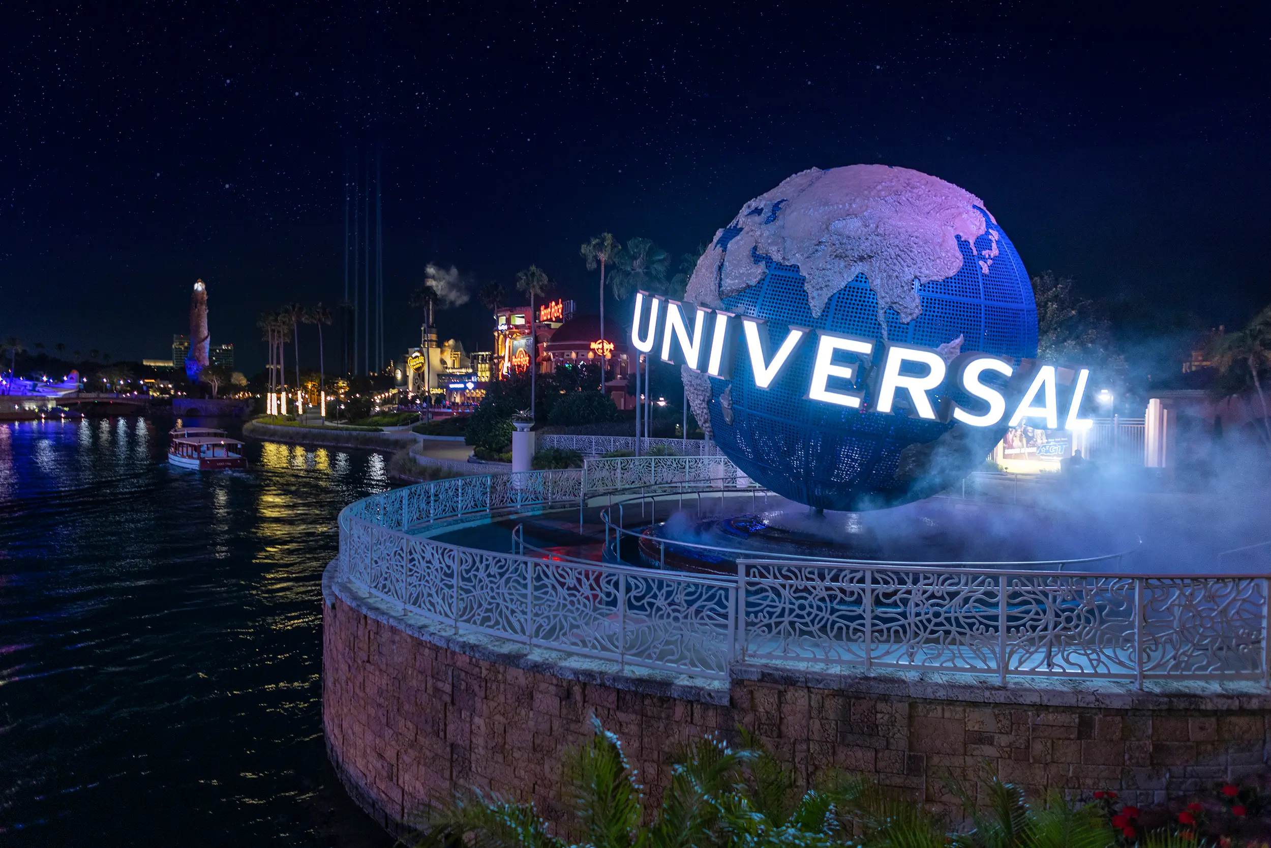 The Universal globe illuminated at night